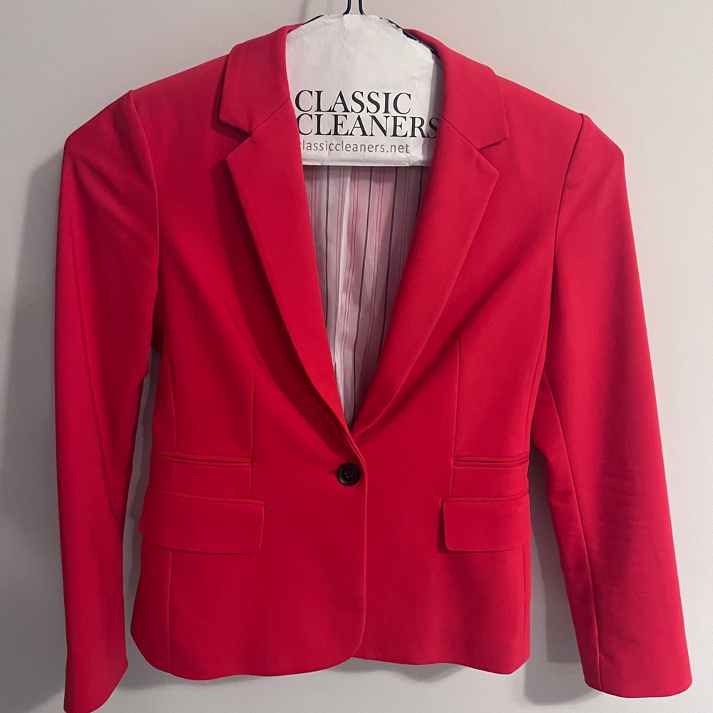 Pink/reddish size 6 express blazer. Worn 2x and then the office went to casual